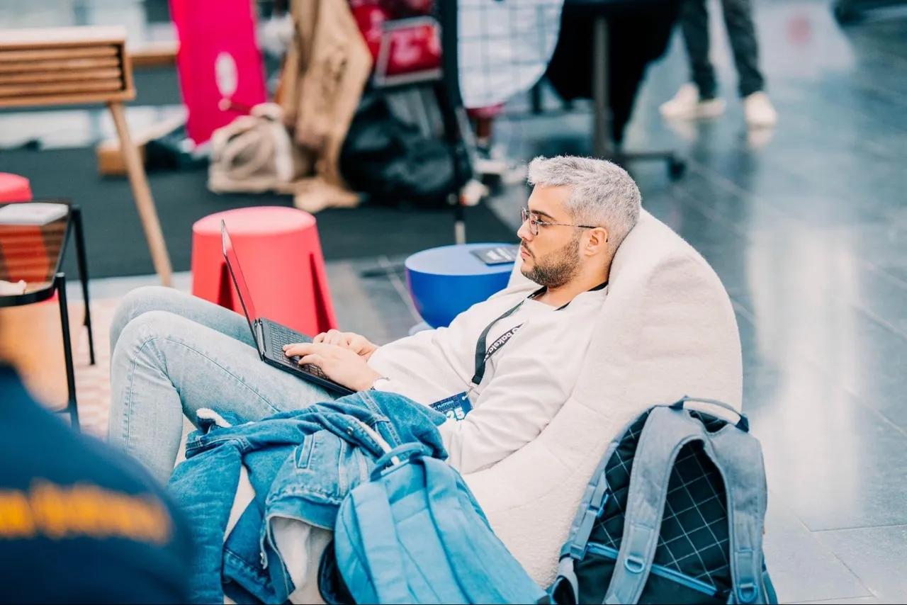 Aziz in a comfortable sofa